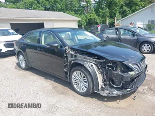 2014 Lexus ES 330 with VIN JTHBK1GG4E2144284, listed as a IAAI auction lot 42447111 with 107,099 mi miles and . Bid and sale history available at DreamBid. Image 1.