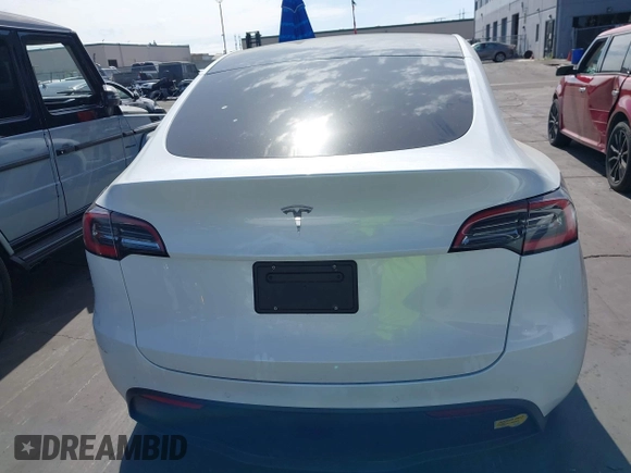 2021 Tesla Model Y Long Range with VIN 5YJYGDEE3MF081304, listed as a IAAI auction lot 41706240 with 90,510 mi miles and . Bid and sale history available at DreamBid. Image 16.