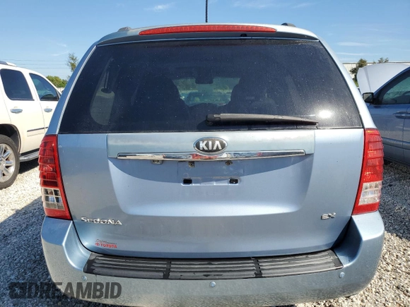 2014 Kia Sedona EX with VIN KNDMH4C77E6549905, listed as a Copart auction lot 77395344 with 97,631 mi miles and Salvage Title. Bid and sale history available at carsss.com. Image 6.