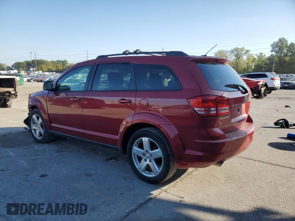 2009 Dodge Journey SXT with VIN 3D4GG57V19T150405, listed as a Copart auction lot 70817743 with 142,969 mi miles and Salvage Title. Bid and sale history available at carsss.com. Image 2.