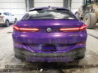 2022 BMW X6 M50i z VIN 5UXCY8C07N9K85135, wystawiony jako Copart lot #45385725 z przebiegiem 57 106 mil mil oraz Szkoda całkowita • Salvage title. Historia ofert i sprzedaży dostępna na DreamBid. Obrazek 6.