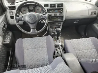 1998 Toyota RAV4 with VIN JT3GP10V7W7031228, listed as a Copart auction lot 53851415 with 99,795 mi miles and Clean title. Bid and sale history available at DreamBid. Image 8.