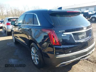 2021 Cadillac XT5 FWD Premium Luxury z VIN 1GYKNCRS2MZ141440, wystawiony jako IAAI lot #41874409 z przebiegiem 76 911 mil mil oraz . Historia ofert i sprzedaży dostępna na DreamBid. Obrazek 3.