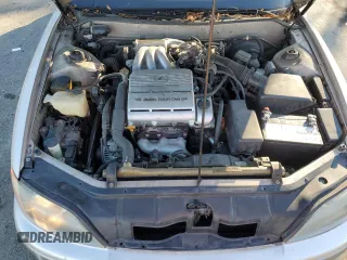 1995 Lexus ES 300 с VIN JT8GK13TXS0121401, выставлен на аукционе Copart как лот 74987404 с пробегом 90 900 миль миль и Списание • Salvage title. История ставок и продаж доступна на DreamBid. Изображение 11.