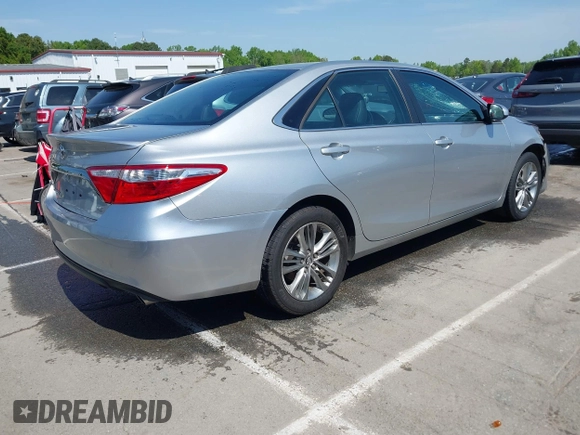 2015 Toyota Camry XLE with VIN 4T1BF1FK1FU100580, listed as a IAAI auction lot 42002060 with 111,739 mi miles. Bid and sale history available at carsss.com. Image 4.
