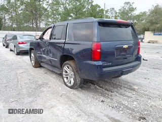 2019 Chevrolet Tahoe LT with VIN 1GNSCBKC7KR133119, listed as a IAAI auction lot 41570650 with 114,575 mi miles and . Bid and sale history available at DreamBid. Image 3.
