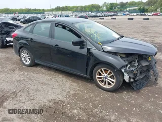 2018 Ford Focus SE z VIN 1FADP3F29JL231220, wystawiony jako IAAI lot #42279185 z przebiegiem 78 615 mil mil oraz . Historia ofert i sprzedaży dostępna na DreamBid. Obrazek 1.