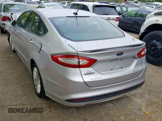 2016 Ford Fusion SE Hybrid with VIN 3FA6P0LUXGR397589, listed as a Copart auction lot 58180612 with 72,400 mi miles and Salvage Title. Bid and sale history available at carsss.com. Image 3.