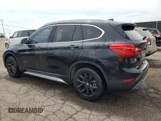 2017 BMW X1 xDrive28i with VIN WBXHT3C37H5F76075, listed as a Copart auction lot 53315395 with 143,141 mi miles and Clean title. Bid and sale history available at DreamBid. Image 2.