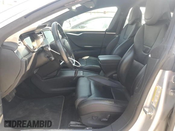 2017 Tesla Model S 60 with VIN 5YJSA1E17HF189627, listed as a Copart auction lot 64454635 with 106,003 mi miles and Salvage title. Bid and sale history available at DreamBid. Image 7.