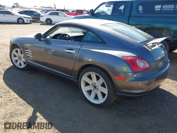 2004 Chrysler Crossfire z VIN 1C3AN69L14X007112, wystawiony jako IAAI lot #40656585 z przebiegiem 99 674 mil mil oraz . Historia ofert i sprzedaży dostępna na DreamBid. Obrazek 3.