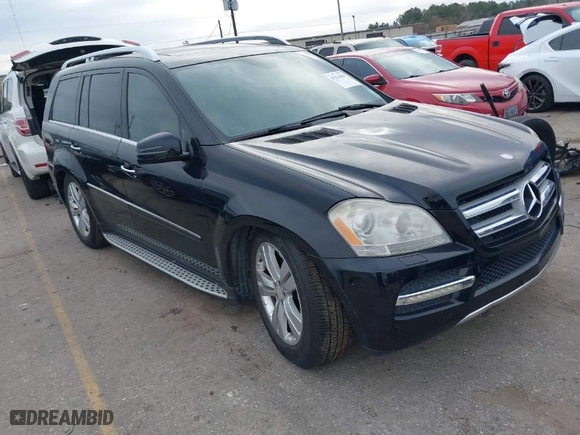 2012 Mercedes-Benz GL-Class GL 450 with VIN 4JGBF7BE7CA795275, listed as a IAAI auction lot 41274429 with 141,818 mi miles. Bid and sale history available at carsss.com. Image 1.