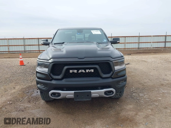 2020 Ram 1500 Rebel with VIN 1C6SRFLT5LN113514, listed as a IAAI auction lot 41718662 with 56,730 mi miles and . Bid and sale history available at DreamBid. Image 12.