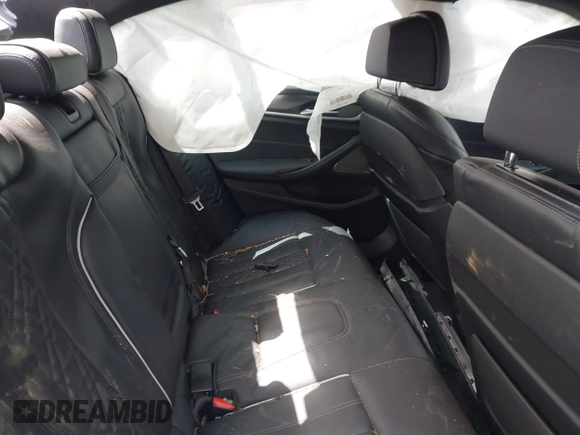 2022 BMW 5 Series M550i xDrive with VIN WBA13BK08NCJ54124, listed as a IAAI auction lot 41977413 with Not provided miles and . Bid and sale history available at DreamBid. Image 8.