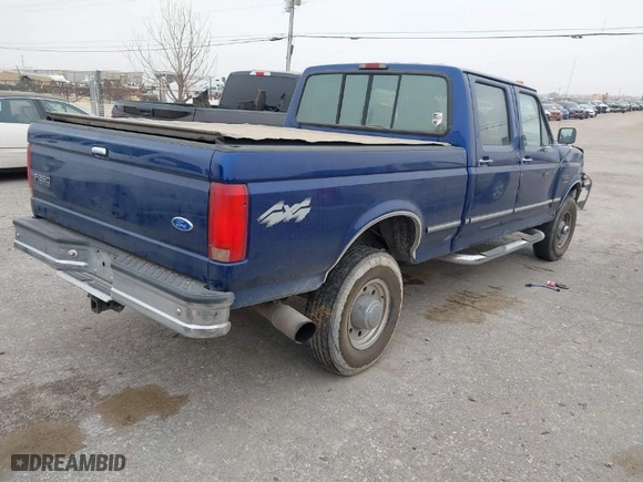 1997 Ford F-250 HD Crew Cab with VIN 1FTHW26F5VEC79447, listed as a IAAI auction lot 41441689 with NaN miles. Bid and sale history available at carsss.com. Image 4.