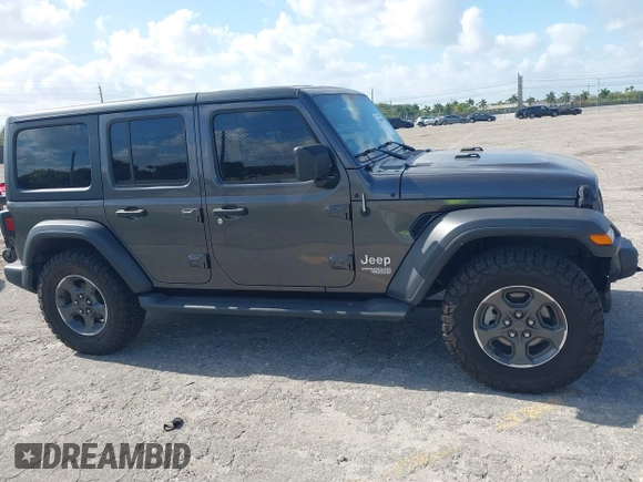 2019 Jeep Wrangler Unlimited Sport S z VIN 1C4HJXDN9KW636592, wystawiony jako IAAI lot #42159099 z przebiegiem 82 580 mil mil oraz . Historia ofert i sprzedaży dostępna na DreamBid. Obrazek 14.