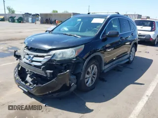 2014 Honda CR-V EX-L with VIN 2HKRM3H71EH551594, listed as a IAAI auction lot 42028963 with 117,506 mi miles and . Bid and sale history available at carsss.com. Image 2.