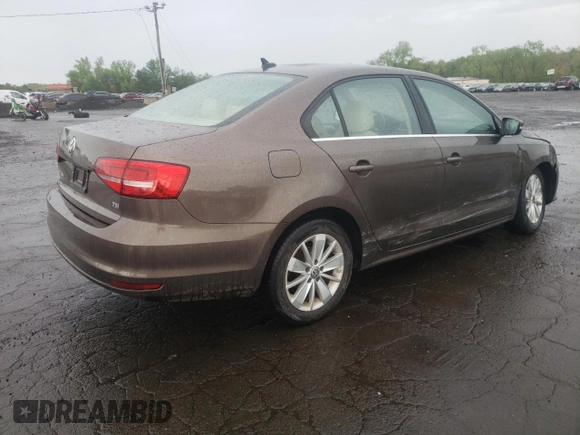 2015 Volkswagen Jetta SE z VIN 3VWD17AJ1FM422960, wystawiony jako Copart lot #55860335 z przebiegiem 87 616 mil mil oraz Czysty tytuł • Clean title. Historia ofert i sprzedaży dostępna na DreamBid. Obrazek 3.