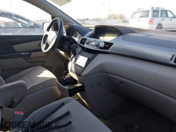 2012 Honda Odyssey LX with VIN 5FNRL5H24CB145694, listed as a IAAI auction lot 41902821 with 134,402 mi miles and . Bid and sale history available at carsss.com. Image 5.