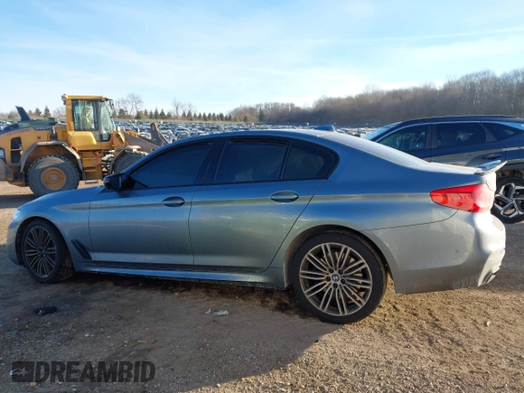 2019 BMW 5 Series M550i xDrive with VIN WBAJB9C51KB464283, listed as a IAAI auction lot 41397420 with Not provided miles and . Bid and sale history available at DreamBid. Image 14.