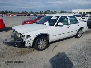 2005 Mercury Grand Marquis LS Premium z VIN 2MEFM75W05X621461, wystawiony jako IAAI lot #41381365 z przebiegiem 139 971 mil mil oraz . Historia ofert i sprzedaży dostępna na DreamBid. Obrazek 2.