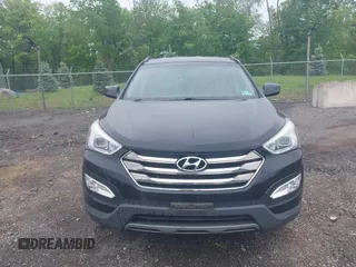 2014 Hyundai Santa Fe z VIN 5XYZUDLB9EG224174, wystawiony jako IAAI lot #42244140 z przebiegiem 84 341 mil mil oraz . Historia ofert i sprzedaży dostępna na DreamBid. Obrazek 6.