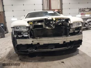 2014 Rolls-Royce Wraith with VIN SCA665C59EUX84389, listed as a IAAI auction lot 41413368 with 57,951 mi miles. Bid and sale history available at carsss.com. Image 6.