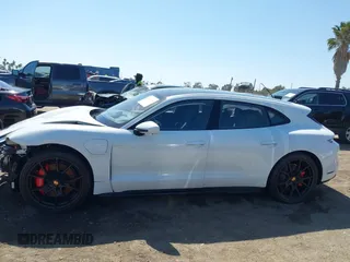 2023 Porsche Taycan GTS z VIN WP0CD2Y14PSA90216, wystawiony jako IAAI lot #42397991 z przebiegiem 1 868 mil mil oraz . Historia ofert i sprzedaży dostępna na DreamBid. Obrazek 14.