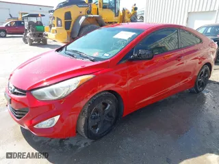 2013 Hyundai Elantra Coupe GS with VIN KMHDH6AE7DU010199, listed as a IAAI auction lot 41756810 with 122,158 mi miles. Bid and sale history available at carsss.com. Image 2.