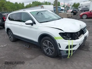 2018 Volkswagen Tiguan SEL z VIN 3VV2B7AX7JM099570, wystawiony jako IAAI lot #42374274 z przebiegiem 87 838 mil mil oraz . Historia ofert i sprzedaży dostępna na DreamBid. Obrazek 1.