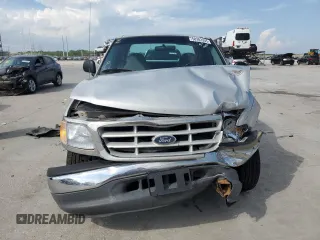 1999 Ford F-150 with VIN 1FTZX1729XNB67194, listed as a Copart auction lot 58383345 with Not provided miles and Salvage title. Bid and sale history available at DreamBid. Image 5.