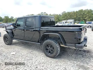 2023 Jeep Gladiator Sport S with VIN 1C6HJTAG9PL525183, listed as a Copart auction lot 54556735 with 13,805 mi miles and Salvage title. Bid and sale history available at DreamBid. Image 2.