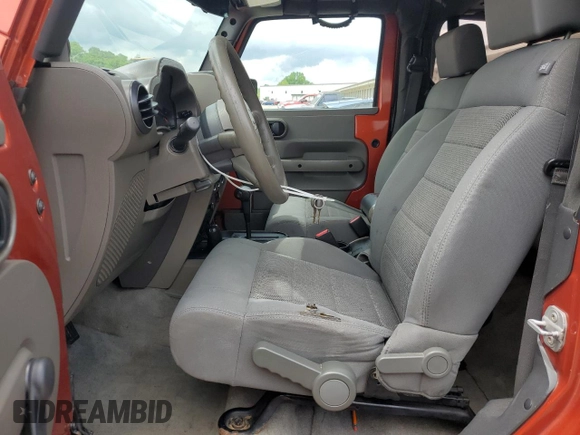2009 Jeep Wrangler X z VIN 1J4FA24139L740959, wystawiony jako Copart lot #56509075 z przebiegiem 121 927 mil mil oraz Szkoda całkowita • Salvage title. Historia ofert i sprzedaży dostępna na DreamBid. Obrazek 7.