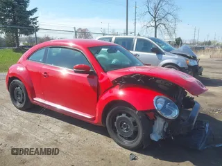 2012 Volkswagen Beetle 2.5L w/Sound/Nav PZEV with VIN 3VWJP7AT6CM620285, listed as a IAAI auction lot 42094101 with 125,737 mi miles and . Bid and sale history available at DreamBid. Image 1.