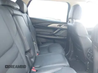 2023 Mazda CX-9 Touring Plus with VIN JM3TCBAY9P0657854, listed as a IAAI auction lot 41931409 with 54,036 mi miles and . Bid and sale history available at DreamBid. Image 8.