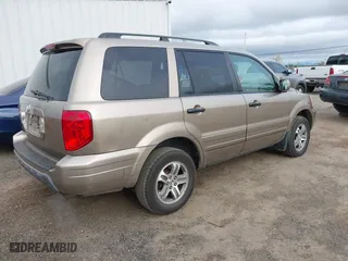 2004 Honda Pilot EX with VIN 2HKYF18594H523176, listed as a IAAI auction lot 41937743 with 310,344 mi miles. Bid and sale history available at carsss.com. Image 4.