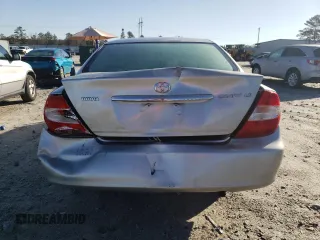 2004 Toyota Camry LE with VIN 4T1BE32KX4U841134, listed as a Copart auction lot 48545975 with 173,697 mi miles and Salvage Title. Bid and sale history available at DreamBid. Image 6.