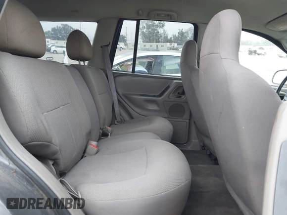 2004 Jeep Grand Cherokee Laredo with VIN 1J4GX48S34C214485, listed as a IAAI auction lot 42208120 with 164,322 mi miles and . Bid and sale history available at DreamBid. Image 8.