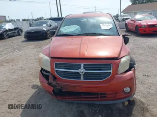 2010 Dodge Caliber Mainstreet z VIN 1B3CB3HA8AD598176, wystawiony jako IAAI lot #42090945 z przebiegiem 85 172 mil mil oraz . Historia ofert i sprzedaży dostępna na DreamBid. Obrazek 12.
