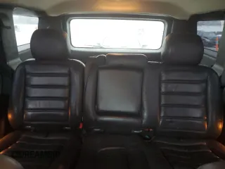 2005 Hummer H2 SUV with VIN 5GRGN23U35H128685, listed as a Copart auction lot 43031545 with 132,053 mi miles and Salvage Title. Bid and sale history available at carsss.com. Image 10.