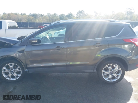 2015 Ford Escape Titanium with VIN 1FMCU0JX1FUB92412, listed as a IAAI auction lot 41893933 with 95,306 mi miles. Bid and sale history available at carsss.com. Image 13.