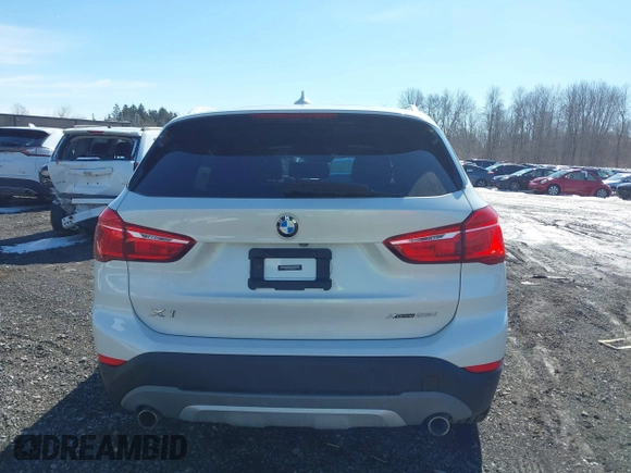 2019 BMW X1 xDrive28i with VIN WBXHT3C58K5N05523, listed as a IAAI auction lot 41752675 with 63,861 mi miles. Bid and sale history available at carsss.com. Image 16.