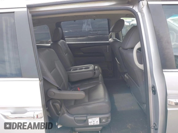 2012 Honda Odyssey EX-L with VIN 5FNRL5H68CB131431, listed as a IAAI auction lot 42012749 with 245,649 mi miles and . Bid and sale history available at carsss.com. Image 8.
