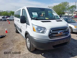 2015 Ford Transit XL z VIN 1FBZX2ZM1FKA83119, wystawiony jako IAAI lot #41994502 z przebiegiem 144 505 mil mil oraz . Historia ofert i sprzedaży dostępna na DreamBid. Obrazek 1.