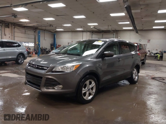 2014 Ford Escape SE with VIN 1FMCU9G9XEUD69423, listed as a IAAI auction lot 41908718 with 65,149 mi miles. Bid and sale history available at carsss.com. Image 2.