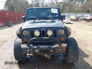 2010 Jeep Wrangler Sport with VIN 1J4AA2D15AL161650, listed as a IAAI auction lot 41805852 with 89,952 mi miles and . Bid and sale history available at carsss.com. Image 6.