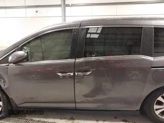 2015 Honda Odyssey EX-L with VIN 5FNRL5H65FB126479, listed as a IAAI auction lot 38993955 with 196,199 mi miles and . Bid and sale history available at carsss.com. Image 14.