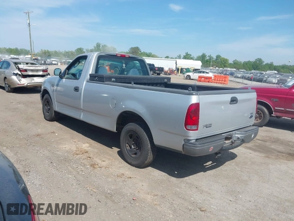 2002 Ford F-150 XL with VIN 1FTRF17202NB42616, listed as a IAAI auction lot 42117616 with 230,852 mi miles. Bid and sale history available at carsss.com. Image 3.