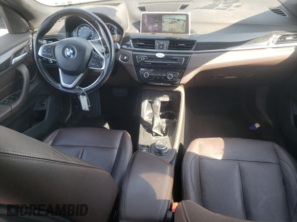 2018 BMW X1 sDrive28i with VIN WBXHU7C32J3H42508, listed as a Copart auction lot 50634735 with 96,713 mi miles and Salvage Title. Bid and sale history available at carsss.com. Image 8.