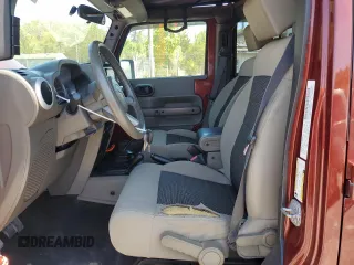2010 Jeep Wrangler Unlimited Sahara with VIN 1J4BA5H11AL107228, listed as a Copart auction lot 54761705 with 102,816 mi miles and Clean Title. Bid and sale history available at carsss.com. Image 7.